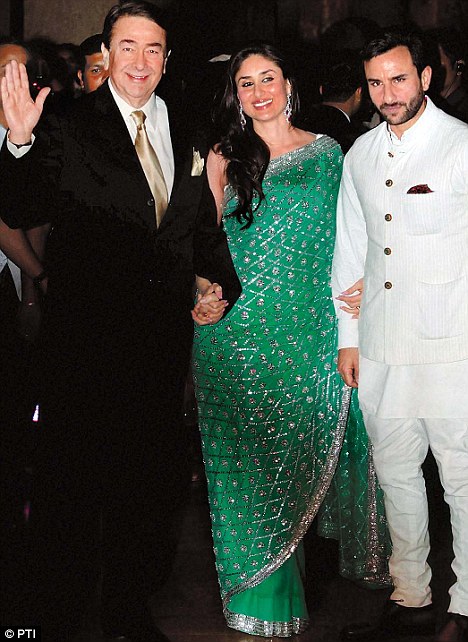 One for the family album: Saif bonds with Kareena's family and has no qualms in going public